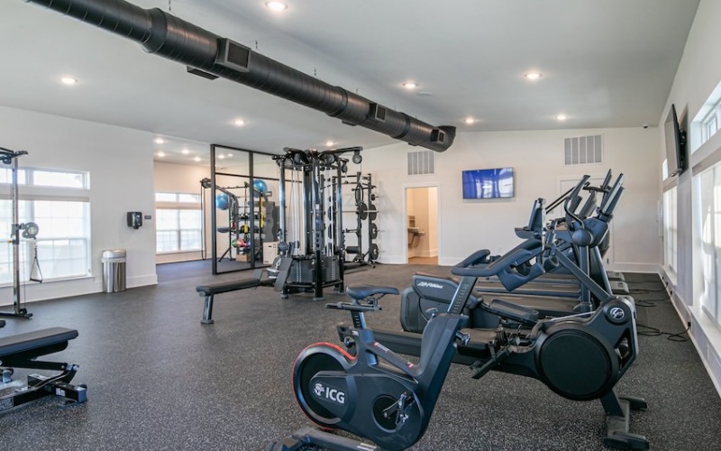 A gym with cardio machines