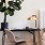 a room with a table and chairs