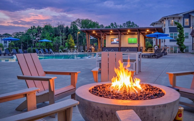evening with a firepit and lounge seating