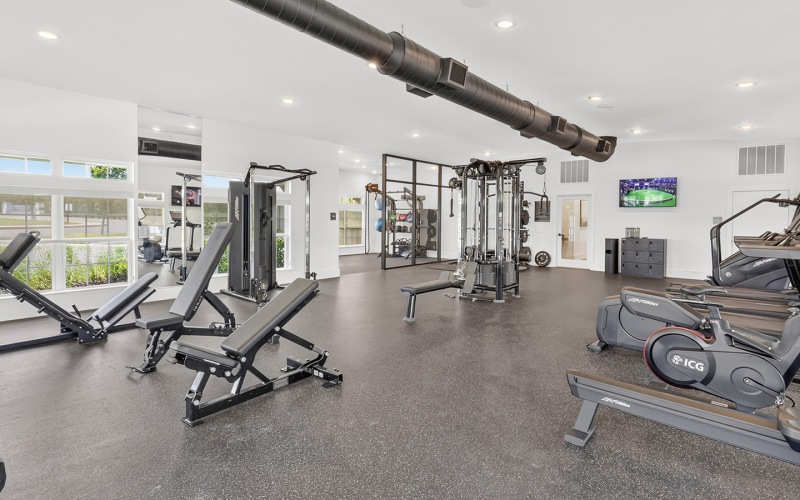 fitness center with exercise equipment
