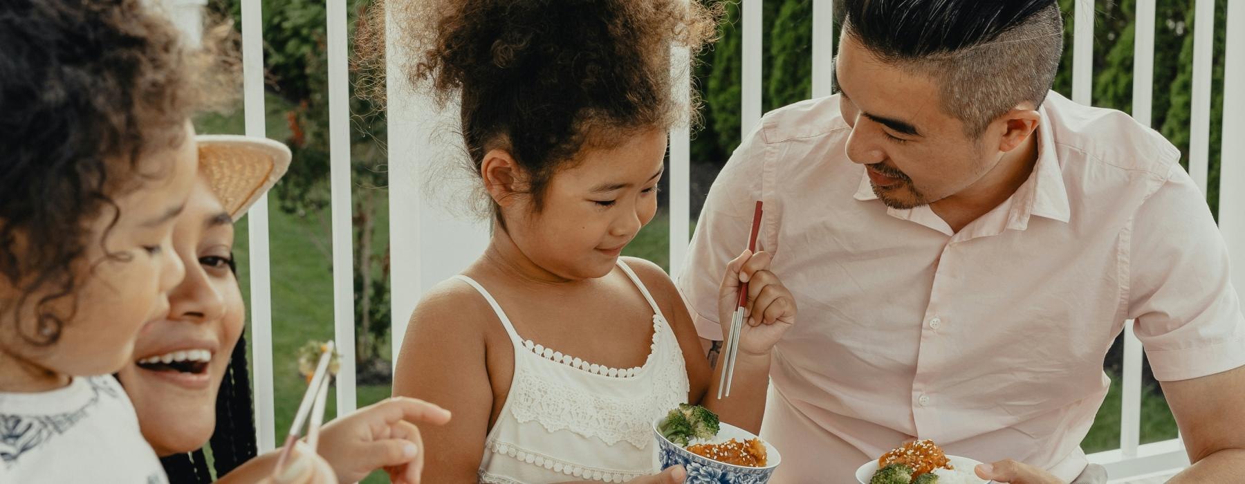 a man and a woman eating cake